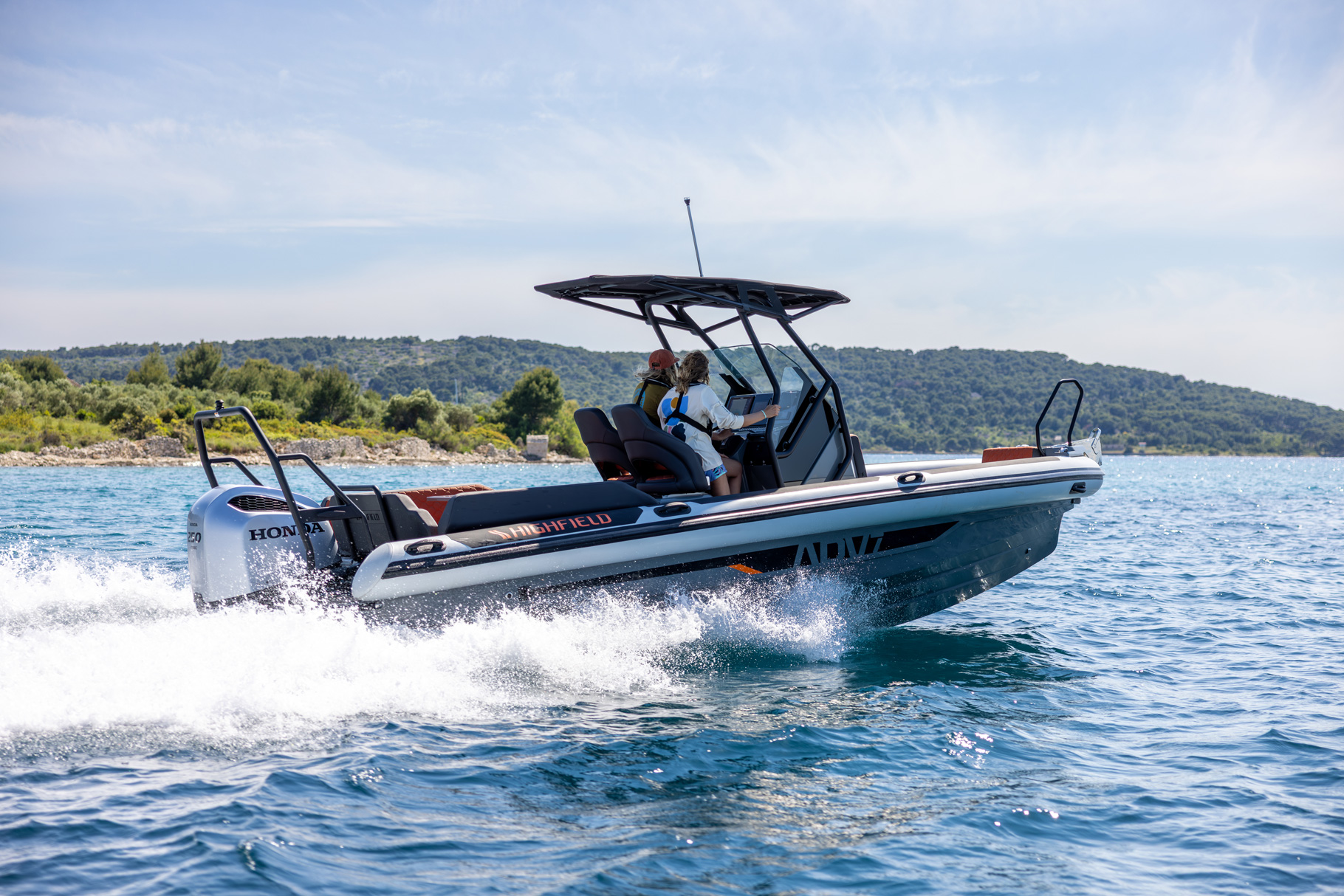 Highfield ADV7 cruising on the water showing its sporty exterior design