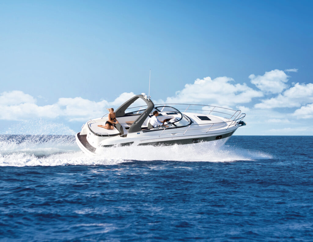 Bavaria S29 motor yacht cruising at speed on open water