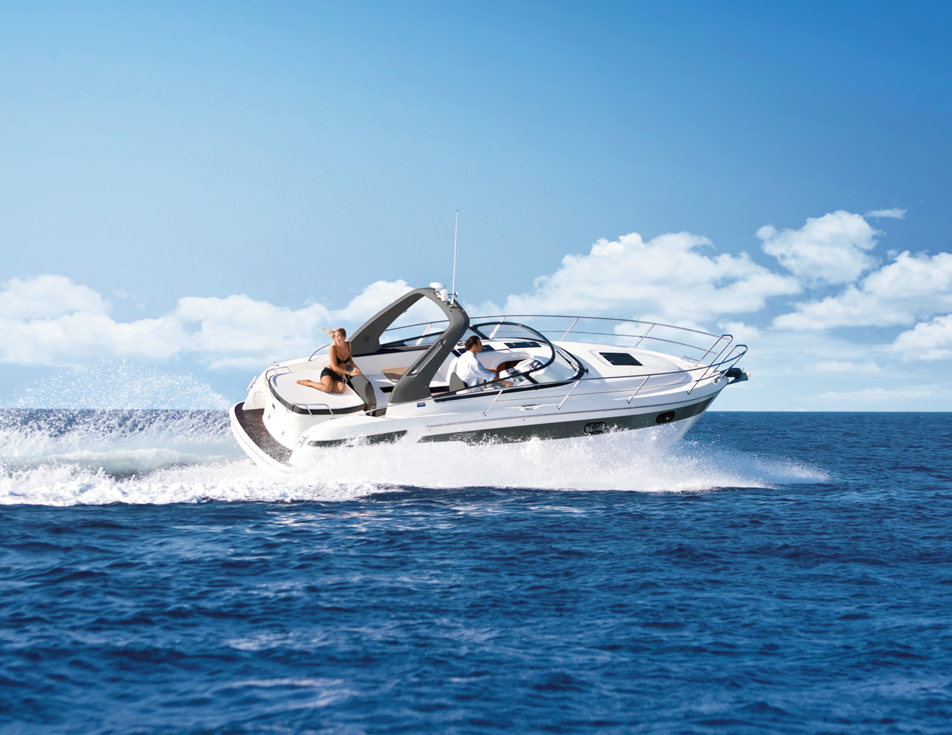 Bavaria S29 motor yacht cruising at speed on open water