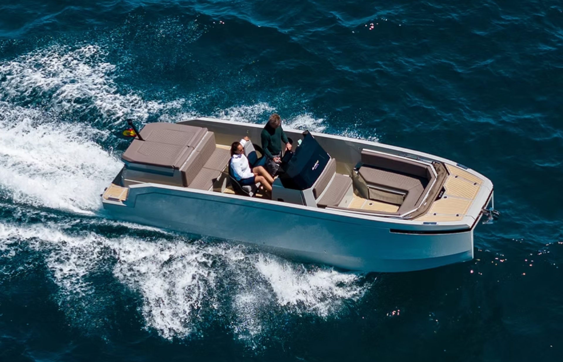 De Antonio E23 electric catamaran cruising at speed on open water