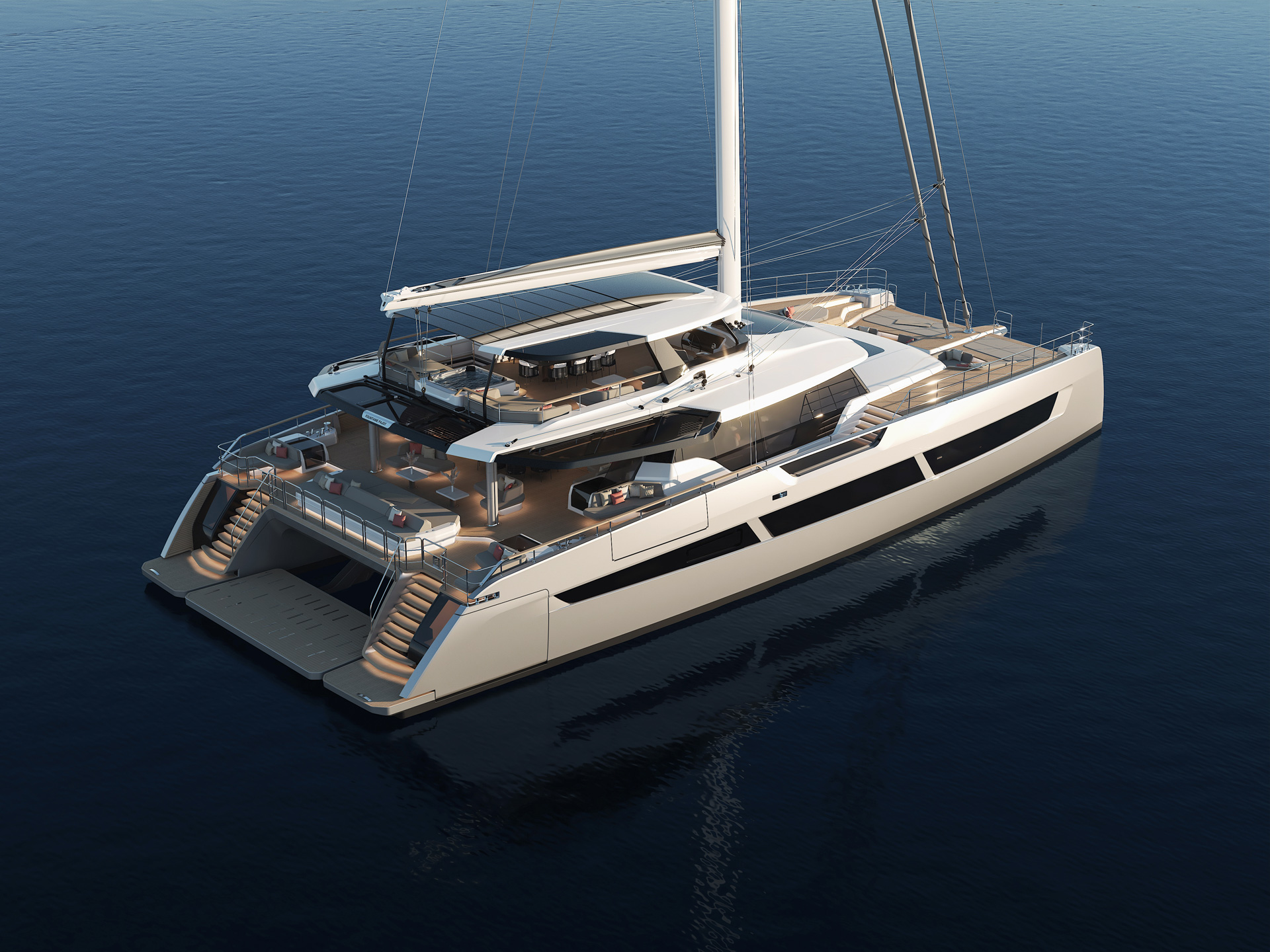 Aerial view of the Fountaine Pajot FPY 120S highlighting its impressive beam and multilevel deck design