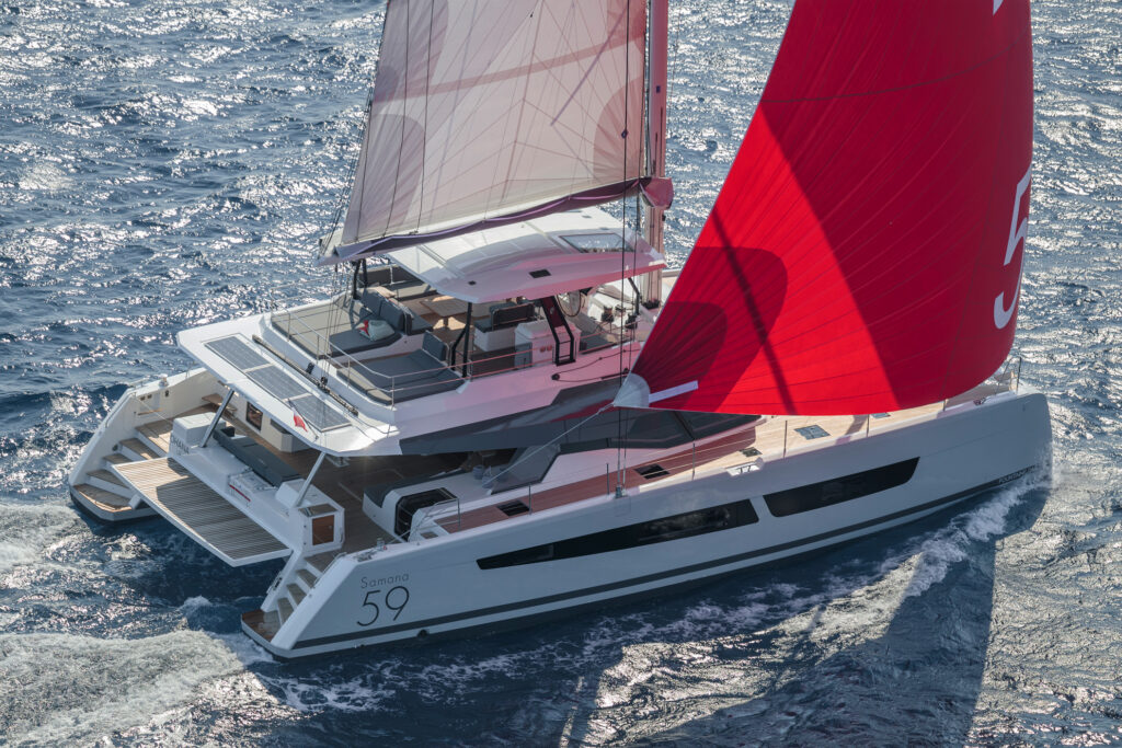 Fountaine Pajot FPY 59S sailing yacht underway with sails raised and spacious deck areas