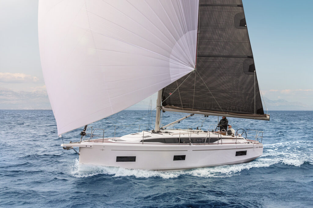 Bavaria C38 sailing yacht cruising under sail at sea