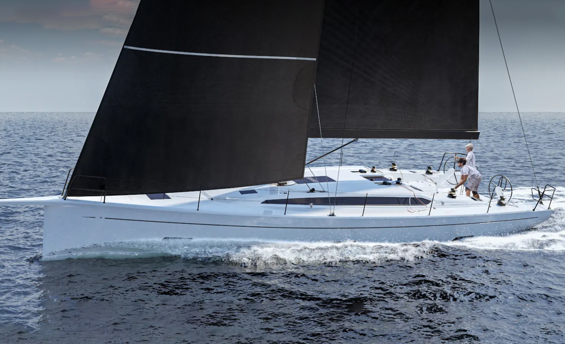 Side view of the Italia Yachts IY 14.98 Fuoriserie sailing yacht underway with dark sails.