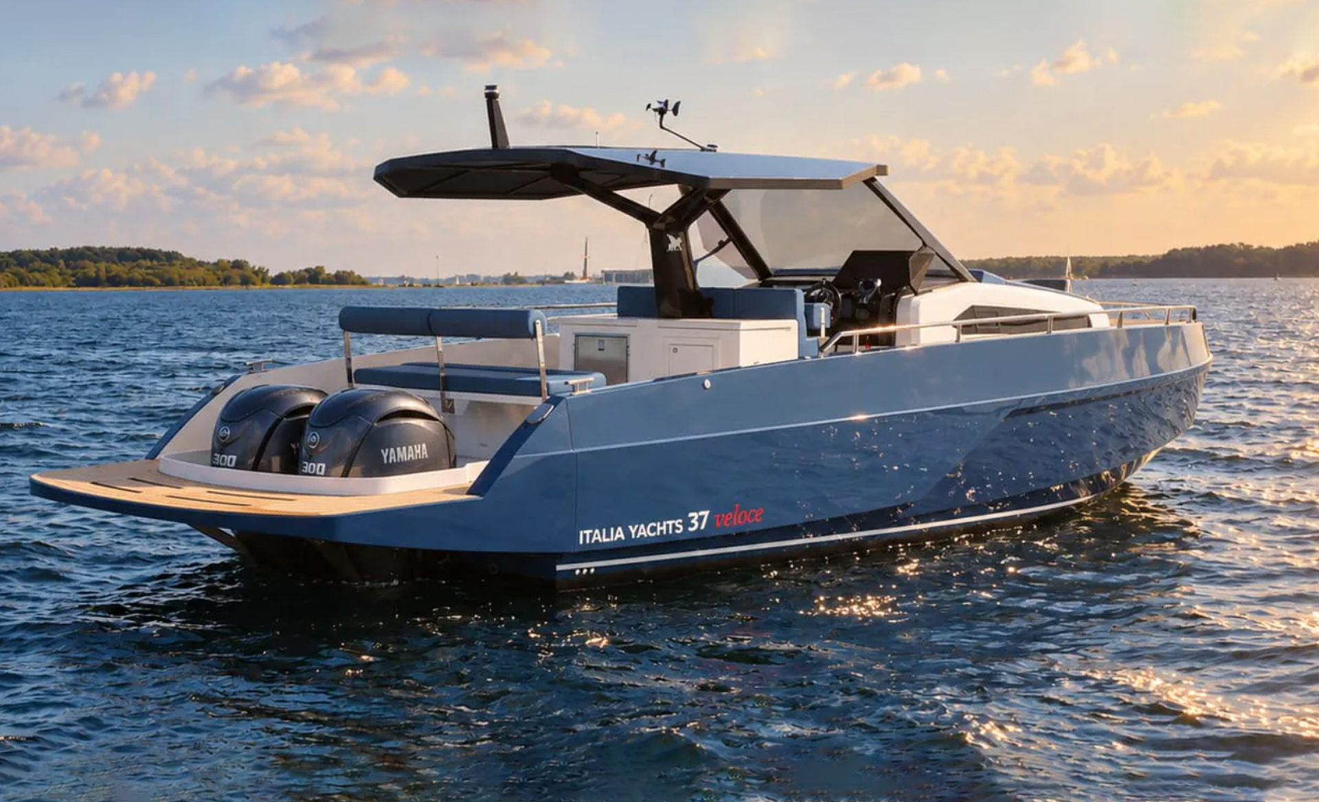 Side view of the Italia Yachts IY 37 Veloce motor yacht on the water, highlighting its sleek hull and modern T-top structure.