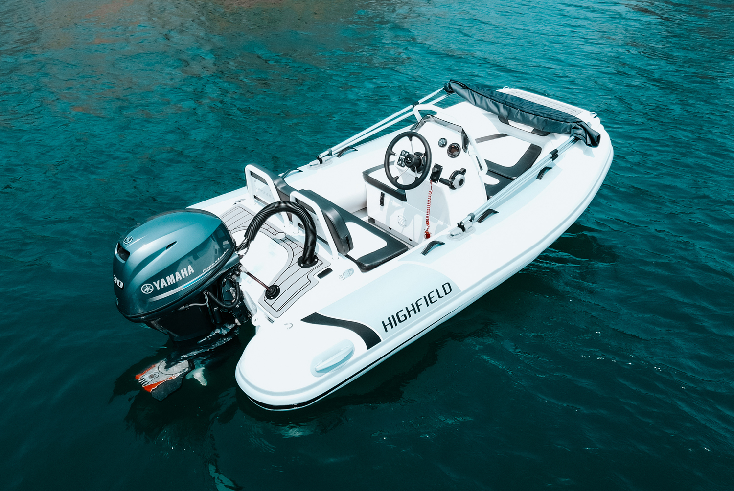 Highfield SP330 Sport RIB viewed from above while cruising on the water