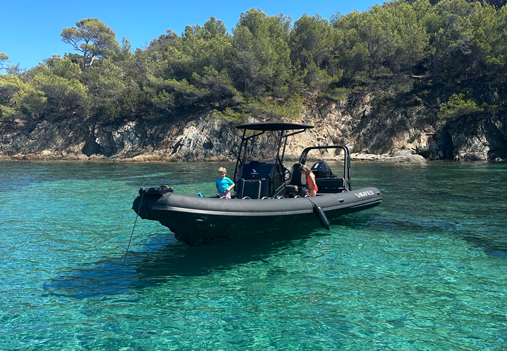 Highfield SP660 Sport RIB anchored in clear coastal waters