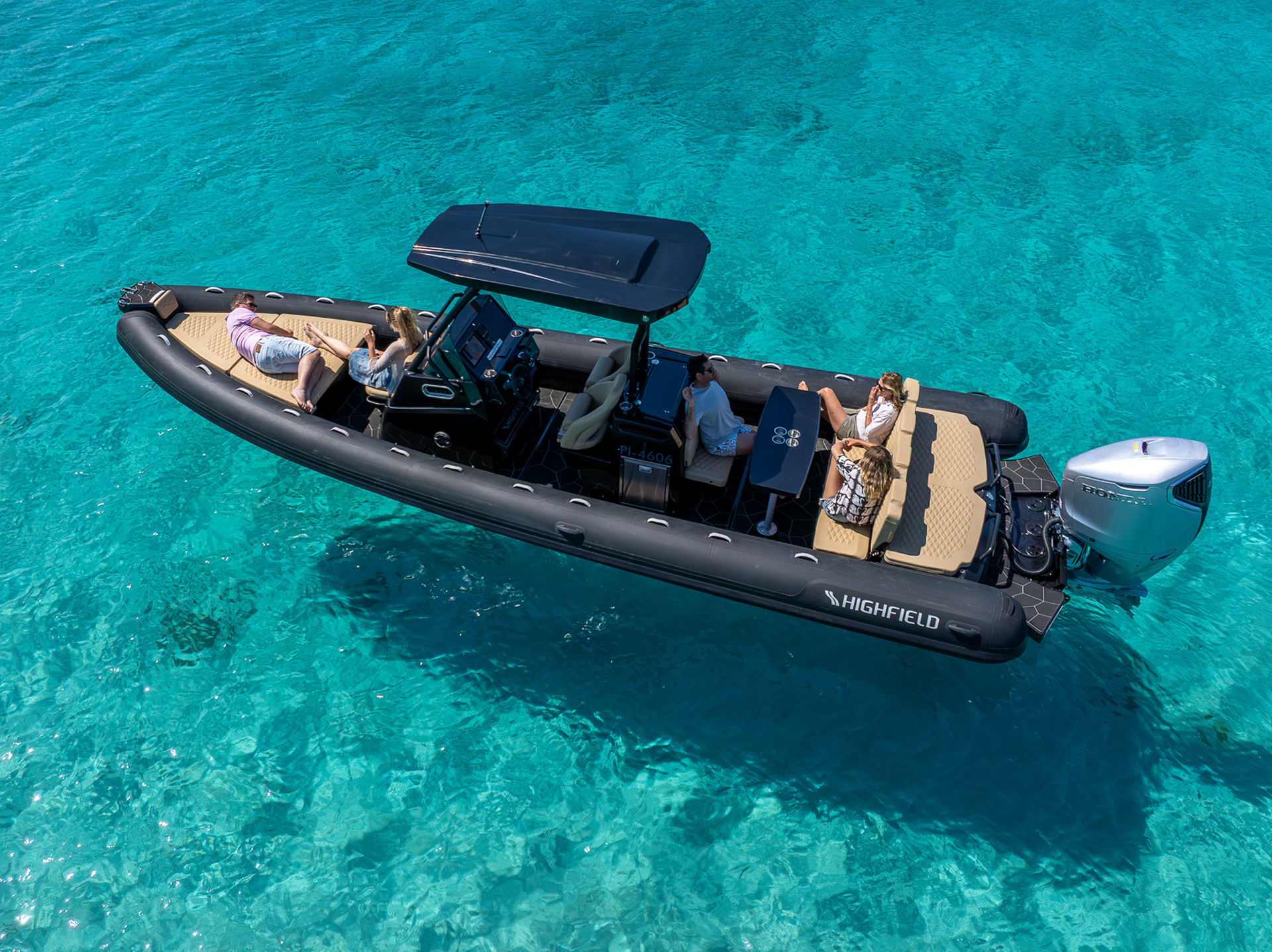 Highfield SP900 Sport RIB viewed from above on clear blue water