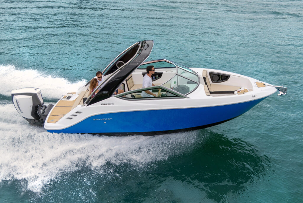 Granfort 242 GTX blue and white sport boat cruising on the water