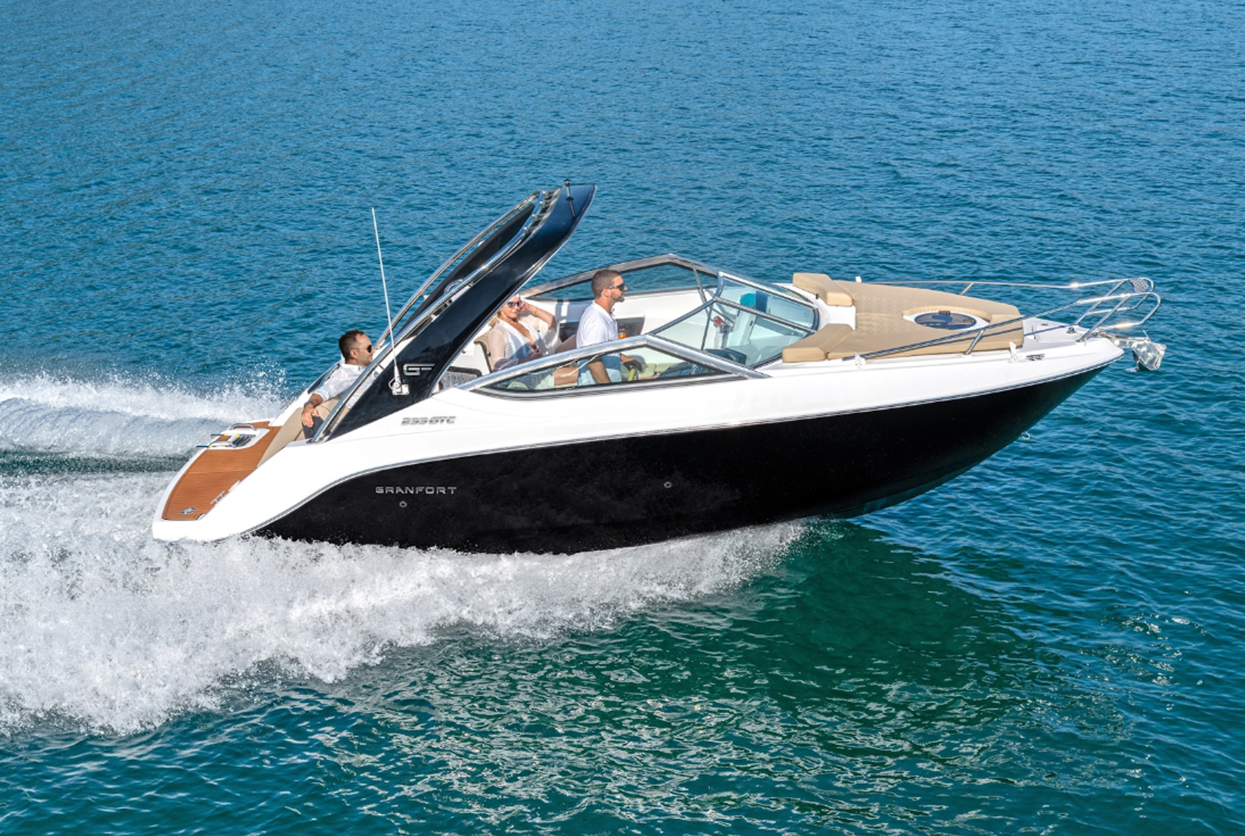 Granfort 242 GTC white and black sport cruiser cruising across the water